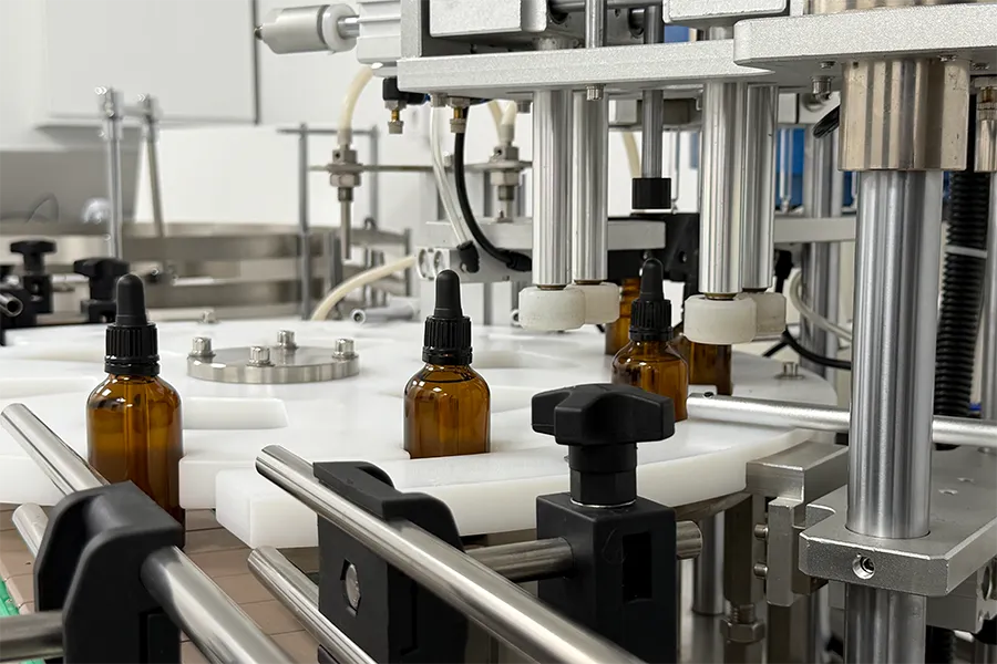 In-house Rgenic supplement production facility with automated filling line and amber dropper bottles, demonstrating full control over manufacturing for strict EU and Swedish safety standards and consistent quality