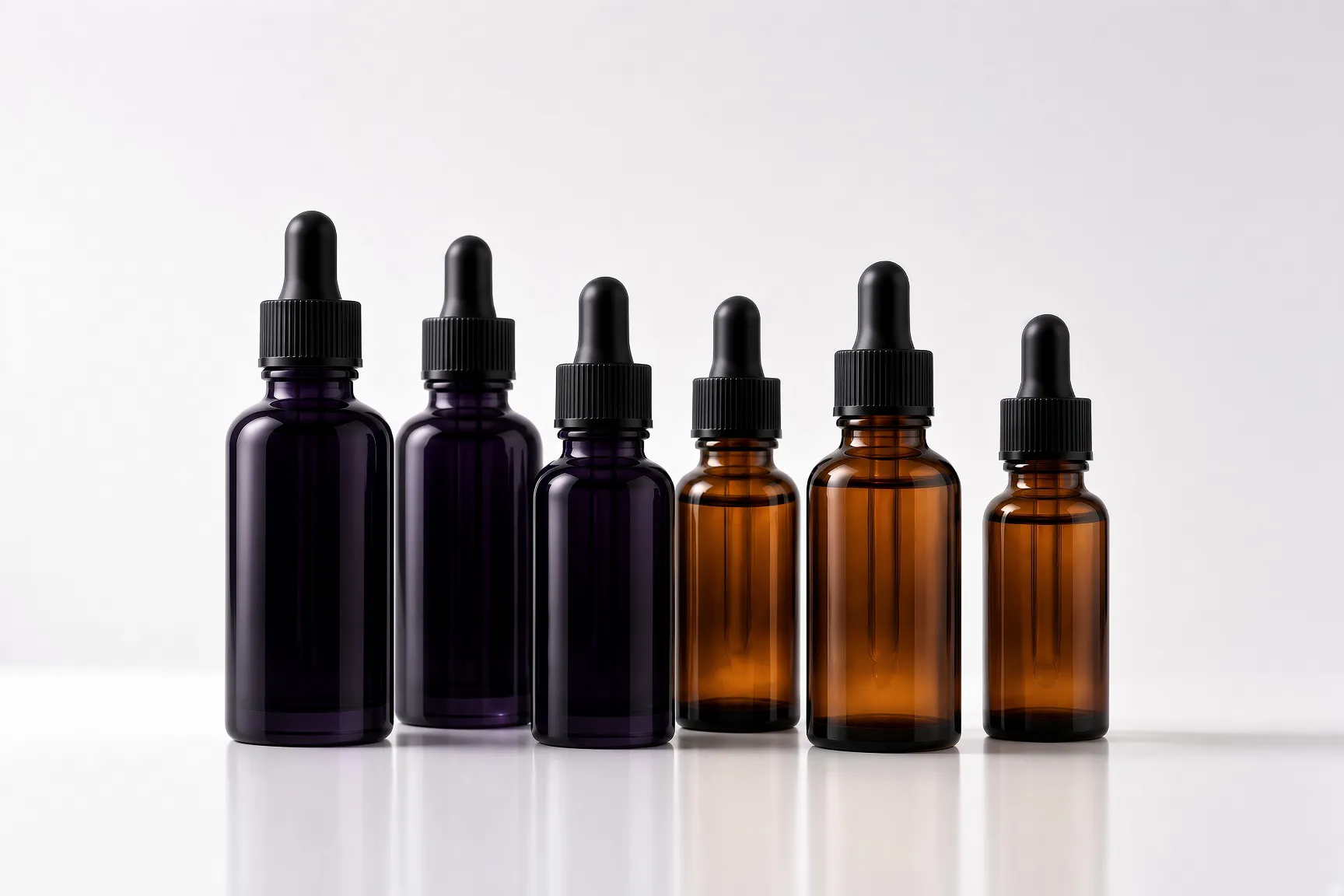 Premium protective violet glass bottles with liquid supplements – pure and uncompromising packaging